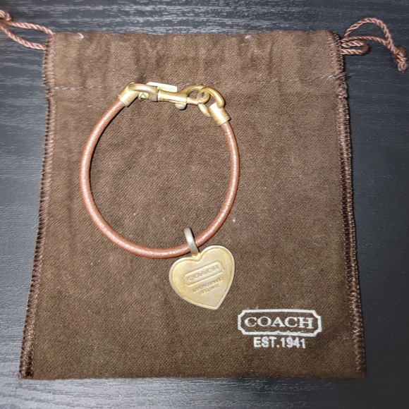 Coach Accessories - Coach Leather And Gold Heart Charm on Brown Bracelet
